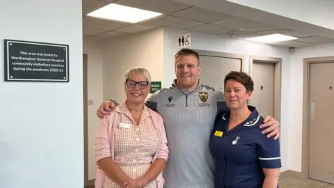 Oliver Conopo/BBC Midwives Claire Dale and Anne Richely with Paull Hill