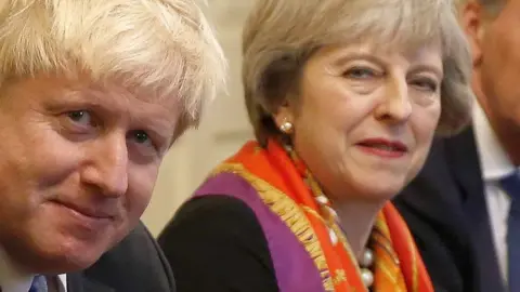 AFP/Getty Images Boris Johnson and Theresa May