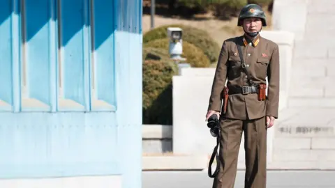 EPA A North Korean soldier at the Joint Security Area on the DMZ