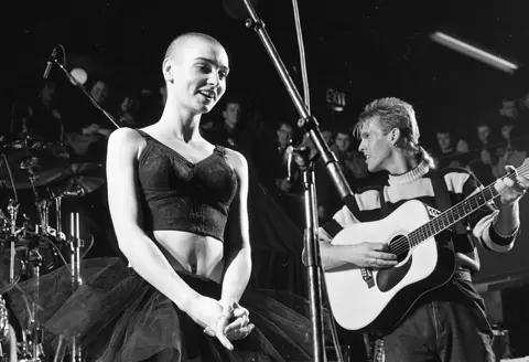 Getty Images Sinead O'Connor on stage at the Olympic Ballroom in Dublin, Ireland, 1988