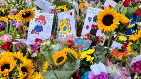 Kate Scotter/BBC Flowers outside Sandringham