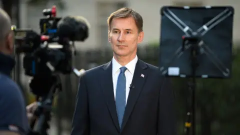 Getty Images Foreign Secretary Jeremy Hunt is interviewed outside 1 Carlton House Terrace on June 24, 2019