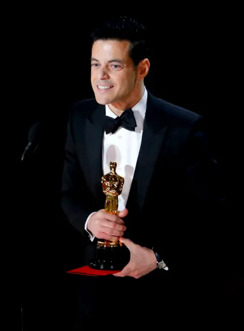 Reuters Rami Malek accepts the Best Actor award