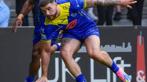 Connor Wrench in action for Warrington Wolves