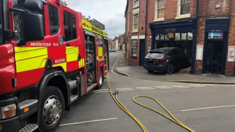 Derbyshire Fire and Rescue Car crashed into window