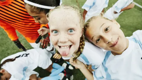 Getty Images Girls playing football