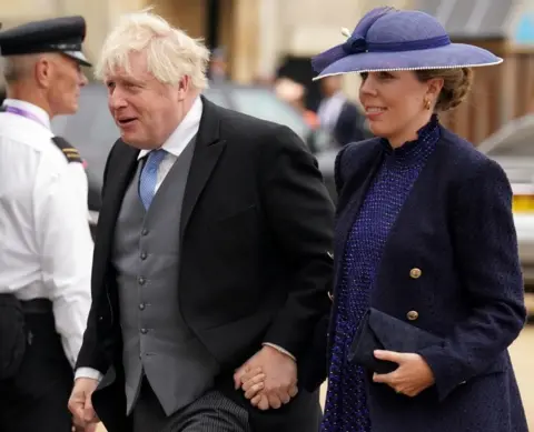 PA Media Former prime minister Boris Johnson and his wife Carrie