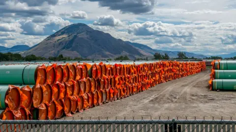 Reuters Stockpiled steel pipe to be used in the construction of the Trans Mountain Expansion Project