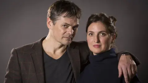 PA Timothy Watson as Rob Titchener and Louiza Patikas as Helen Archer - BBC Radio 4, The Archers