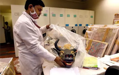 Getty Images Art objects being packed at the Indira Gandhi National Centre for the Arts