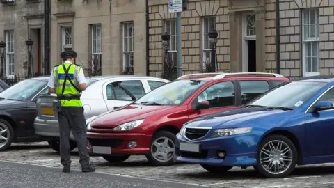 Getty Images Parking warden