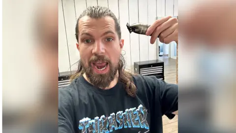 Alex Cole Alex Cole posing with a rasor