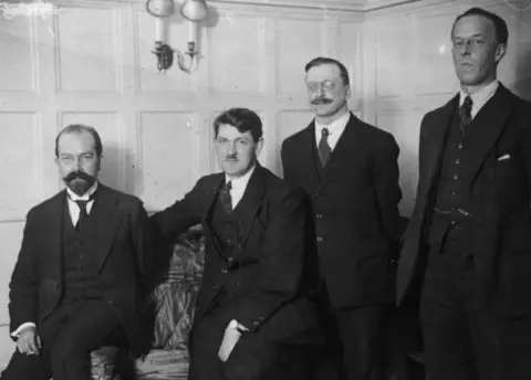 Getty Images/Topical Press Agency/Hulton Archive Gavan Duffy, Michael Collins, Arthur Griffith and Robert Barton during the negotiations