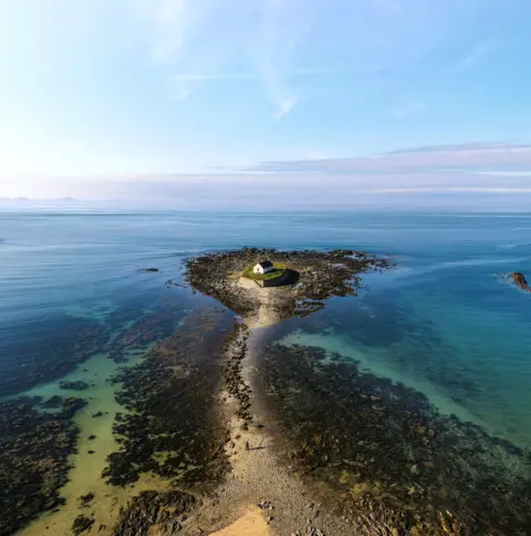 Steve Liddiard Eglwys Cwyfan is a Grade II-listed medieval church in Llangadwaladr, Anglesey