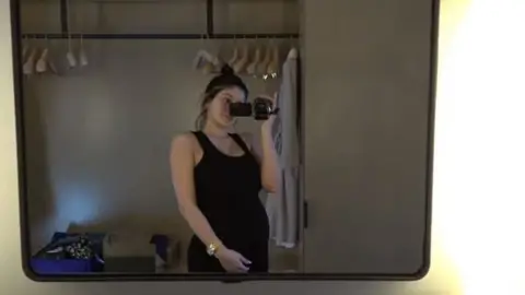 YouTube/Kylie Jenner Kylie Jenner posing in front of a mirror