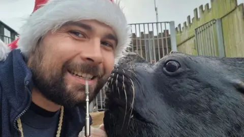 Cornish Seal Sanctuary Elliot Badrick with Diego