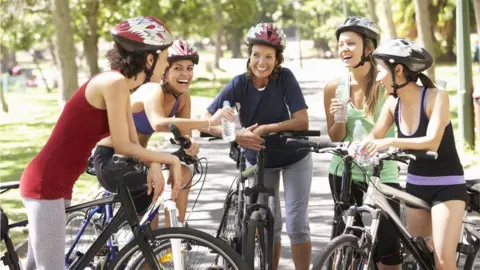 Getty Images Group of women cycling