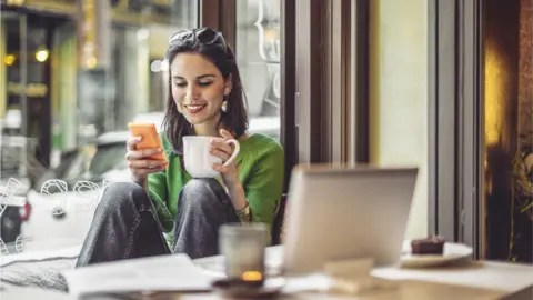 Getty Images woman on mobile phone