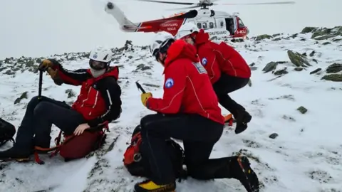 Ogwen Valley Mountain Rescue Organisation Rescuers and Coastguard helicopter