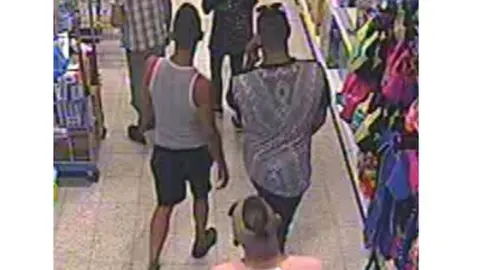 West Mercia Police The backs of three men in CCTV footage