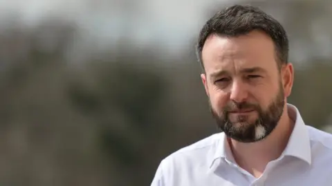 NurPhoto/Getty Images SDLP leader Colum Eastwood