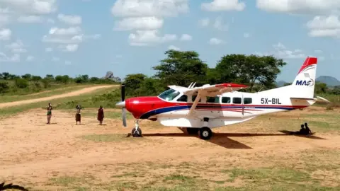 Jill Vine MAF plane in remote location