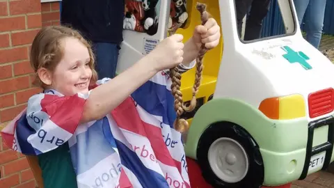 Kaitlynn Ollie has his 14-inch long hair cut to raise money for rescue orphaned and injured seal pups.