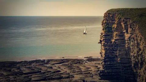 Mark Tugwell A sail boat at Nash Point