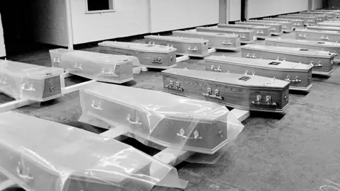 Coffins in a disused factory in Liverpool