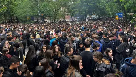 Thousands of people, mainly pupils from other Belgrade schools, converged on the school during the afternoon