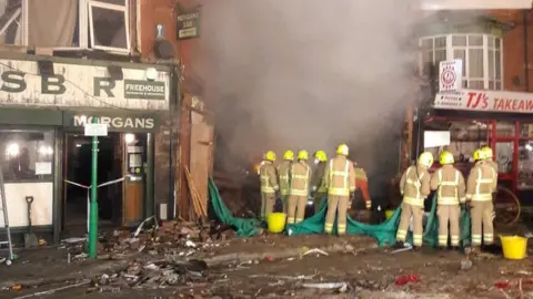 Matthew Cane / Leicestershire Fire and Rescue Aftermath of the explosion in Leicester