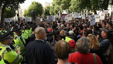 Getty Images Protesters outside Downing Street