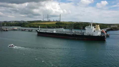 Philip Halling/Geograph Ship and Milford Haven oil refinery in the background