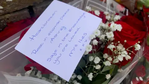 Janine Machin BBC Flowers with a condolence card