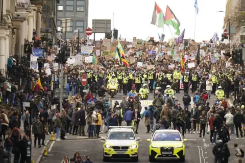 PA Media Climate protestors in Glasgow