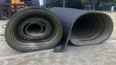 The rolled up artificial pitch