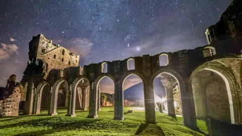 Georgina Harper Monmouthshire's Llanthony Priory under Orion, Taurus, and the Milky Way