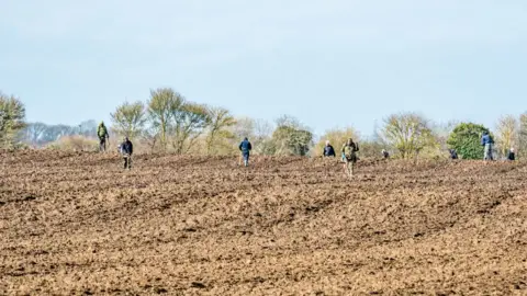 Anthony Morris Metal detectorists in Shifford