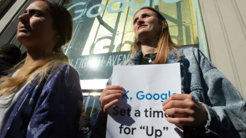 Getty Images Google staff walk out their office in New York in November 2018