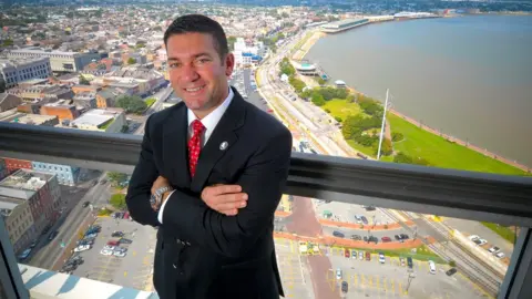 Michael Hecht Michael Hecht with New Orleans stretching out behind him