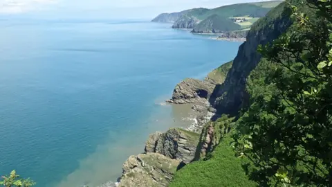 Neil Davies Cliffs jutting out into the sea