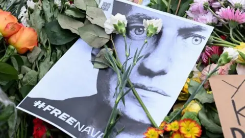 Reuters Picture of Alexei Navalny with flowers