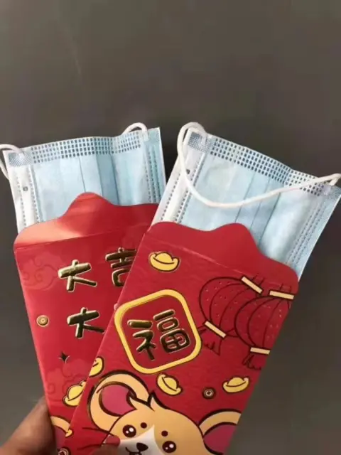 Weibo An image of red envelopes filled by surgical masks