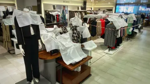 BBC Jarrold ladies fashion floor wrapped in tissue paper