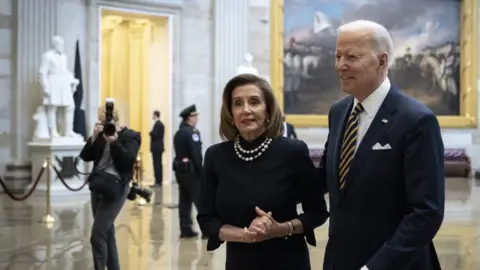 Getty Images Speaker of the House Nancy Pelosi greets President Joe Biden