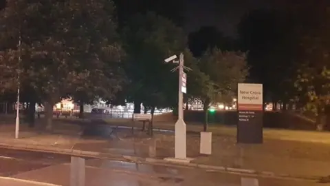 The entrance to New Cross Hospital at night