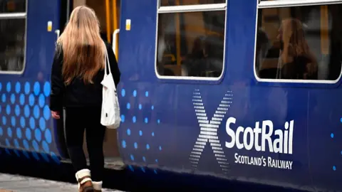 Getty Images ScotRail trains operated by Abellio arrive and depart for Glasgow Central station on December 5, 2016