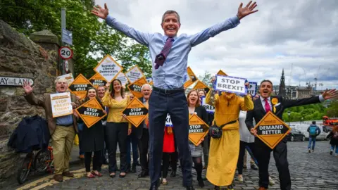 Getty Images Willie Rennie jumping