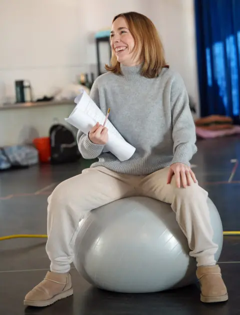 Ash Mills Laura Main on a birthing ball in rehearsals for One Last Push