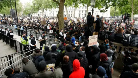 Reuters Demonstrators and police in Whitehall